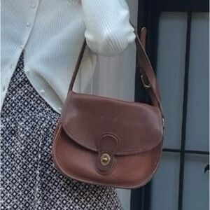 Vintage coach crossbody British tan turnlock 1990s prairie saddle bag purse